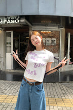 RAINY落書きプリントのアルファベットTシャツ26SA23886Q