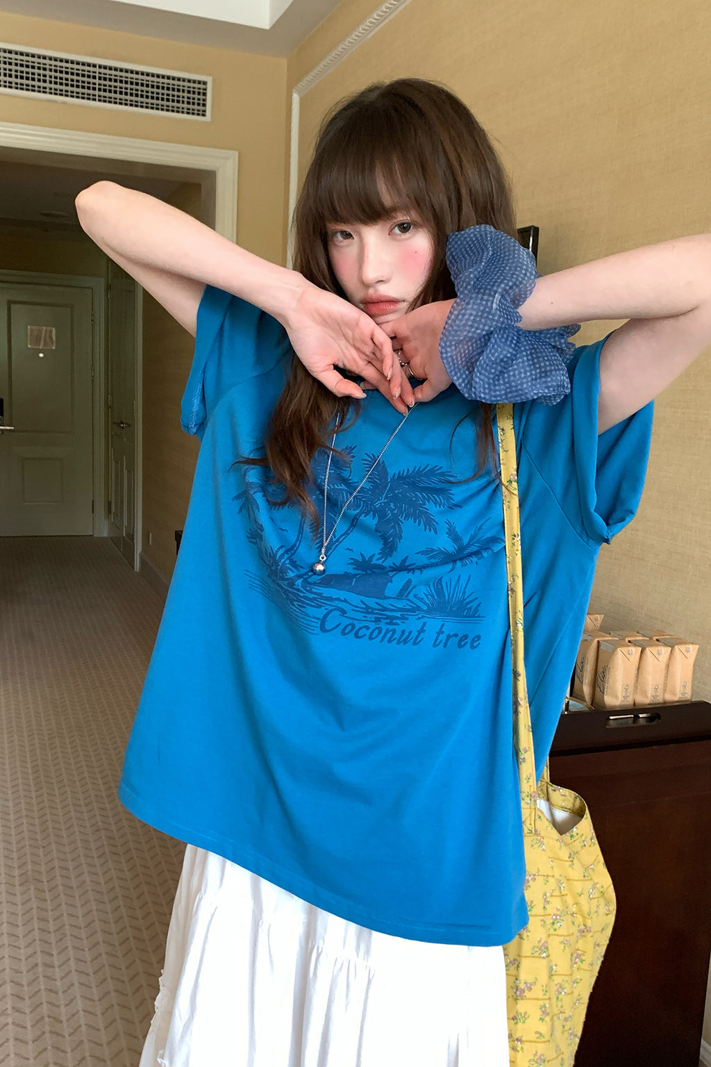 RAINY夏のカジュアルなだるさ感のあるココナツプリントTシャツ26SA23740Y