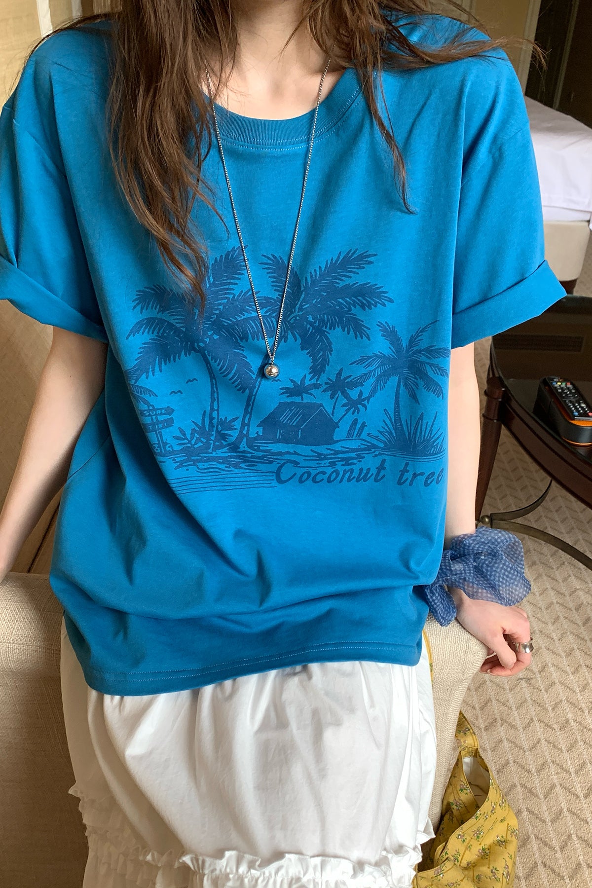 RAINY夏のカジュアルなだるさ感のあるココナツプリントTシャツ26SA23740Y