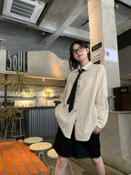 RAINYストライプラグランスリーブ肌理感シャツ女 22FWA1585J